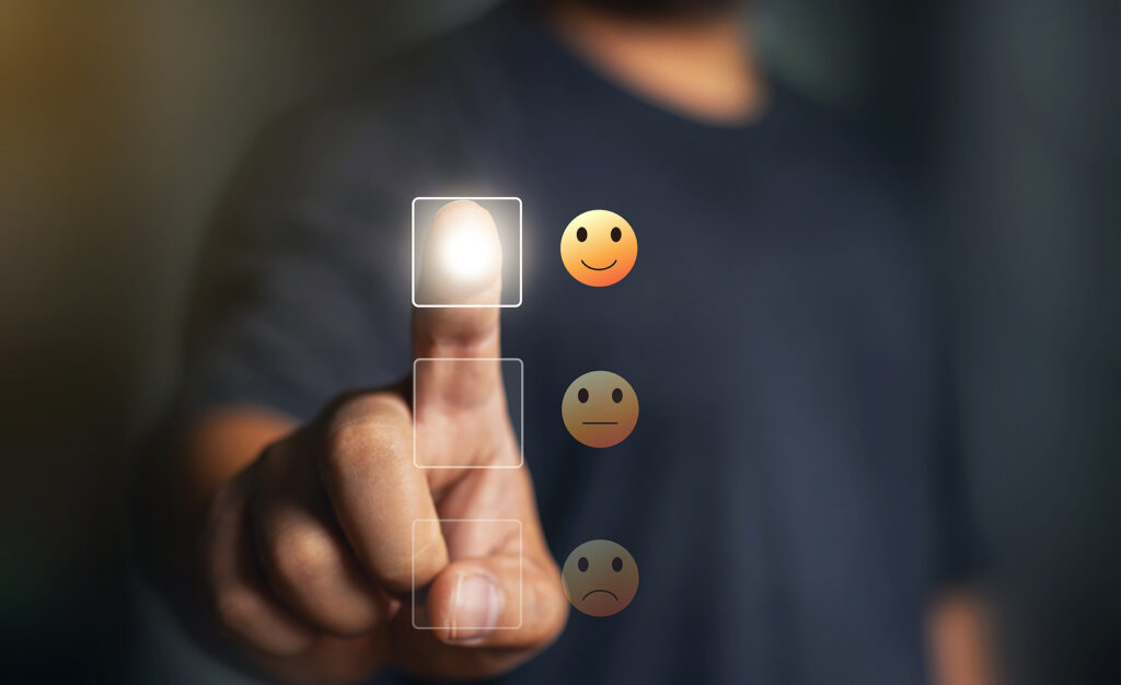 Feedback rating concept, Man choosing smiley face icon. feedback rating and positive customer review experience, business man select happy on satisfaction evaluation. Customer service and Satisfaction