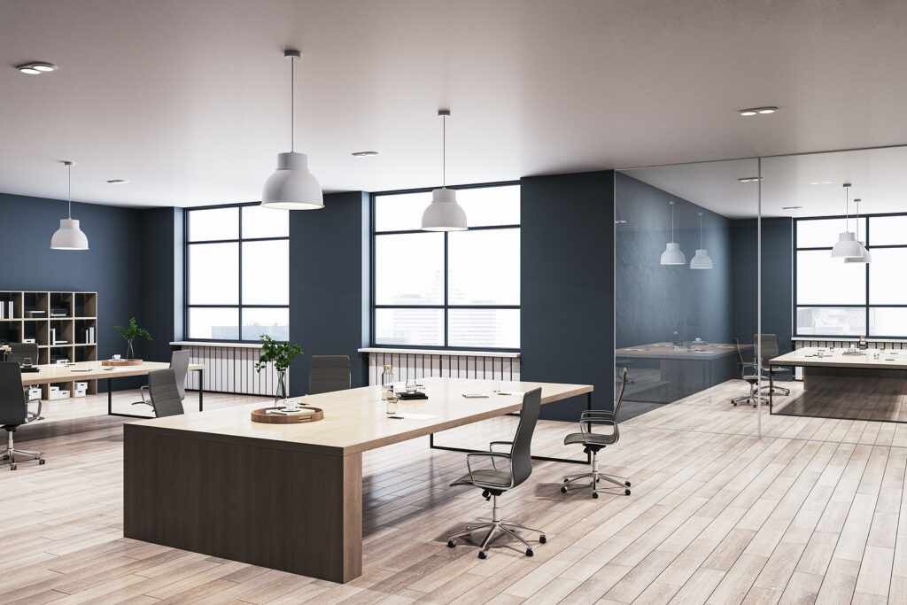 Modern concrete coworking office interior with wooden flooring, furniture, equipment and window with city view. Loft office designs. 3D Rendering