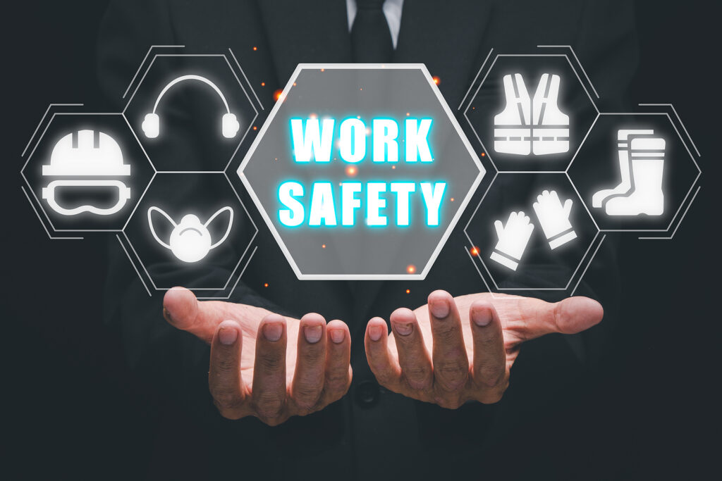 Work safety concept, Businessman hand holding holographic VR screen work safety icon, First secure rules. Health protection, personal security people on job.